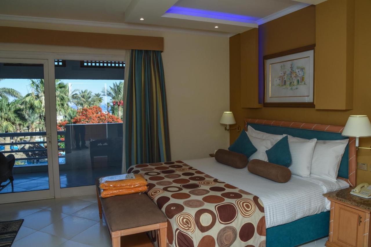 Pickalbatros Golf Beach Resort Sharm El Sheikk Exterior foto A bedroom at the hotel