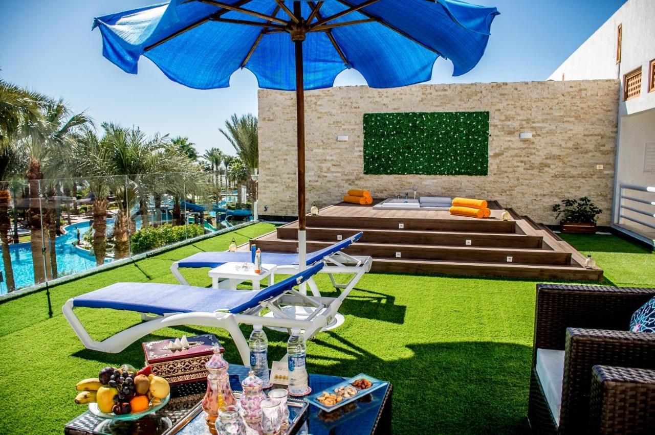 Pickalbatros Golf Beach Resort Sharm El Sheikk Exterior foto The resort's pool area